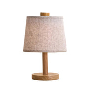 Lampada da tavolo ricaricabile Rover in legno marrone chiaro con paralume in tessuto, wireless, dimmerabile, USB-C, 3 livelli di luce, IP44 resistente agli schizzi
